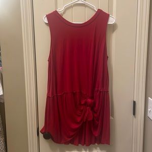 Women’s XL maroon sleeveless blouse with ruffle detail.